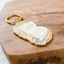 Load image into Gallery viewer, Floral Book Metal Keychain 2x2 in.