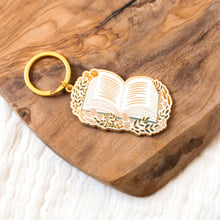 Load image into Gallery viewer, Floral Book Metal Keychain 2x2 in.
